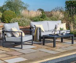 The legs intersect on the floor in the center of the table. Verde Coffee Rectangular Table Black Daro Cane Furniture