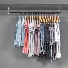 Two tier hanging will give space for short items and give each person their own rail in the wardrobe. Wardrobe Hanger Rail Wardobe Pedia