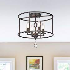 This flush mount circular ceiling light is in modern/contemporary style, proper for various houses the ceiling light fixtures flush mount could be equipped with golden hardware, glass shade and black wrought iron fixture has selection of good quality material, surface is under painting finish. Elena 4 Light Antique Black Metal Round Flush Mount Ceiling Light Overstock 25969967