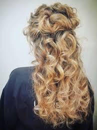 Show off your playful vibe with these mini buns. 40 Incredibly Cool Curly Hairstyles For Women To Embrace In 2020