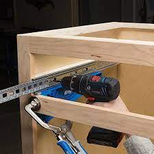 Fitting Drawer Slides Is Easy With The Kreg Drawer Slide Jig Now You Can Eliminate The Guess Wor Woodworking Jigs Woodworking Shop Essential Woodworking Tools