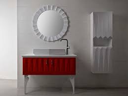 The wooden vanity countertop runs straight on as bathtub panelling and continues all the way up the wall. Red Bathroom Vanity Units Image Of Bathroom And Closet