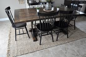 Round rugs tend to soften sharp lines and work well in the center of the room. New Dining Room Jute Rug Little Glass Jar