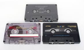 A small flat case containing magnetic tape on two reels, used to record and play back audio and video material. Cassette Wiktionary