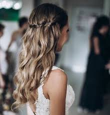 Side fishtail braids with bun. Wedding Boho Hairstyle Beach Waves Soft Curls Messy Hair Braids Bridal Hair Wedding Hair Ha Messy Hairstyles Soft Curl Hairstyles Braids For Long Hair