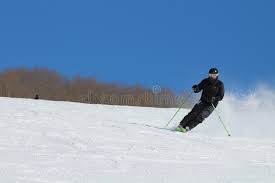 When you are in position, lean your knees uphill and take small steps sideways. Skiing Man Going Down The Slope Editorial Photo Image Of Mountain Winter 105285896