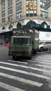 Banksy S Truck Rolls By On Broadway Avenue And Houston Street In New York Nyc Newyork Banksy Art Publicart City Dog New York Street Houston Street