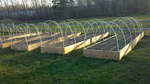 Grow food through the winter with this easy to build raised bed garden hoop house. Raised Bed Hoop Houses Thehomesteadingboards Com