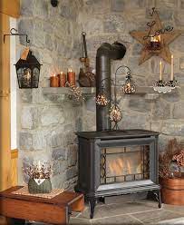 We Have A Wood Stove That I D Love To Have A Stone Wall Behind To Complete The Rustic Look Wood Stove Decor Corner Wood Stove Wood Stove Surround