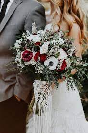 Your wedding dress can be made instantly perfect for a christmas themed wedding by adding a broad red or silver sash. Fall Bridal Bouquet Wedding Party Ideas Wedding Inspiration Fall Bridal Bouquet Fall Winter Wedding