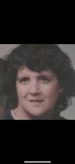 How can I find my mother's biological family, the DeLucas, in  Mechanicsburg, PA?