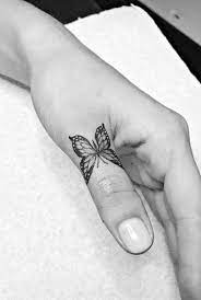 Finger Butterfly Tattoo Finger Butterfly Tattoo Odd Stuff Magazine Butterfly Butterflyt Small Hand Tattoos Butterfly Tattoos For Women Finger Tattoos