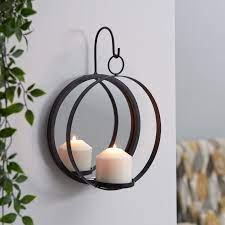 Only 1 available and it's in 3 people's carts. Danya B Round Iron Pillar Candle Sconce With Mirror Black