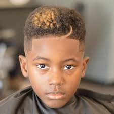 The shortest haircut represents a buzzed style with a few lined details. 23 Best Black Boys Haircuts 2021 Guide
