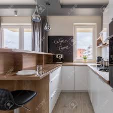Whether you are on a budget or you are looking for particular worktop types that will what kitchen worktop types are there? Contemporary Kitchen With Wooden Worktop And White Kitchen Cupboards Stock Photo Picture And Royalty Free Image Image 117076133