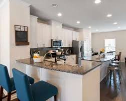 Although small, these dimensions still allow for a practical working island, including the option of integrated appliances. Table Height Kitchen Island All You Need To Know