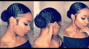 This cool and casual style works well with hair that can easily be tied in a ponytail, with the to do a bun for short hair, add texture to your hair, and then pick it all up to create a ponytail as high up as you can go. Natural Hair In A Bun How To Make It Look Awesome No Matter The Length