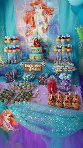 Little Mermaid Party Under The Sea Candy Table Caramel Apples Rolo Kisses Rice Krispy Chocolate S Ariel Birthday Party Mermaid Theme Party Ariel Birthday