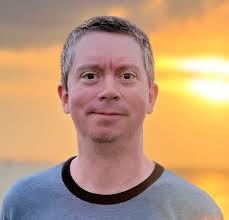 Sarasota native plays key role in newspaper's presentation of news.