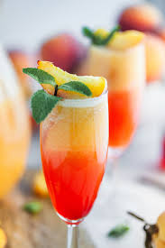 Frozen Peach Bellini Olive Mango Frozen Peach Bellini Peach Bellini Recipe Peach Bellini