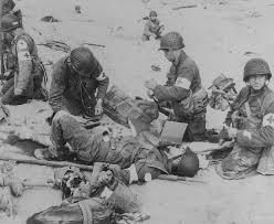At least 20,000 french people were killed in the battle of normandy. Medics Treat A Fellow Wounded Medic On Utah Beach D Day 75 D Day Exhibit Pritzker Military Museum Library Chicago