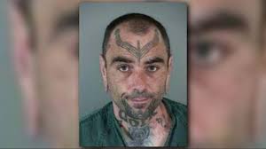 FBI: Tattooed man with 'dork'