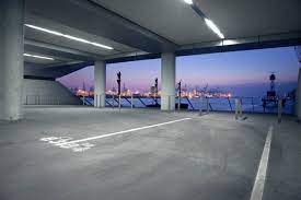 Rhododendron buds with parking lot on background. Empty Parking Lot With A View Over The Hamburg Harbour Maground Photography Architecture Backplate Background Cgibackground Purple Sky Architecture Empty