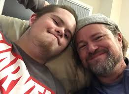 Who is this giant man hanging out with me?