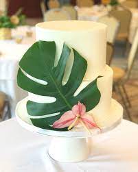 Simple Monstera Leaf On Buttercream Tropical Wedding Cake Simple Wedding Cake Wedding Cake Toppers