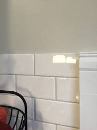 Subway Tile With Warm Gray Grout Sw Agreeable Gray Wall Color Grey Grout Grey Wall Color Kitchen Tiles Backsplash