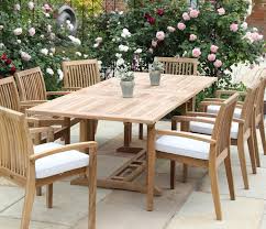 Marbled ceramic on glass top with black metal base. Double Extending Teak Dining Table Jo Alexander