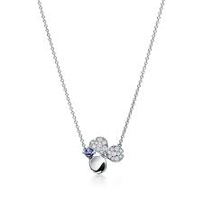 We always strive for new interpretations, combining beauty with modernism, like in the tiffany paper flowers collection. Tiffany Paper Flowers Diamond And Tanzanite Flower Pendant In Platinum Tiffany Co