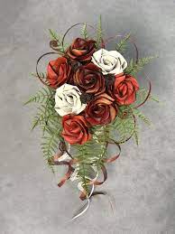 To be honest my garden is looking a. Waterfall Bouquet In Autumn Tones Flax Flowers Flower Bouquet Wedding Wedding Bouquets