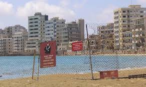 A 1970s resort city now stands abandoned, caught in the middle of a divided island. Varosha Black Owl