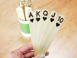 Style me pretty shows you how to make another type of paper flower using playing cards, this time by rolling whole cards into cylinders rather than cutting them into pieces.you could turn this flower into just about anything! Sleight Of Hand With A Twist 15 Great Crafts Made With Playing Cards