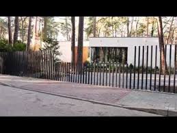 Maybe you would like to learn more about one of these? This New Fancy Fence System Retracts Gate Directly Into Ground Archdaily Fancy Fence Garden Cabins Fence Design