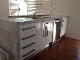 There are 24 three drawer, 24 & 18 & 15 cabinets with drawers, a 13 above the stove cabinet, and a lazy suzan in the corner. Forte Custom Cabinets Home Facebook