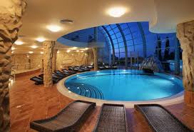 Fantastic Swimming Pool Designs With Indoor Concept With Oval Shaped Decor Finished In Mod Indoor Pool Design Indoor Swimming Pool Design Luxury Swimming Pools