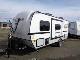 The exterior of the trailer has a large 10′ retractable awning. Top 5 Best Travel Trailers Under 2 000 Lbs Rvingplanet Blog