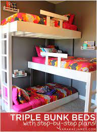 This design combines three individual beds together, so you can sleep two up high and still have space for one bed below. Blog Kara Kae James Bunk Bed Designs Bunk Bed Plans Cool Beds