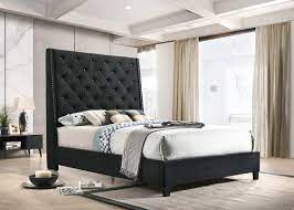 For the uninitiated, an upholstered bed is typically a bed with soft luxurious fabric covering all its wooden parts. Chantilly Black Upholstered Bed Urban Furniture Outlet