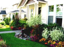 Basic yard design with coordinated flower beds Garden Bed Ideas For Front Of House
