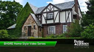 A tree branch and forest greens keep the decor simple, while silvery stars and tin tree luminaries add a hint of holiday decoration. Tudor Style Homes Designs Features Houses For Sale