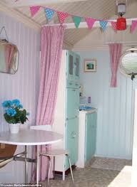 Beach Huts Are More Popular Than Ever But Don T Have To Break The Bank Beach House Interior Beach Hut Decor Beach House Decor
