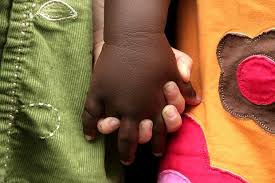 Image result for black and white children holding hands