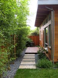 This backyard privacy idea is portable, since the bamboo is in planters, so they can be utilized exactly where you need them. Bamboo Landscaping Guide Design Ideas Pro Tips Install It Direct