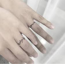 Tattoo designs, tattoo pictures a category wise collection of tattoos. 30 Lovely Ring Tattoo Designs For Couples The Xo Factor