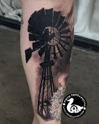 Windmill tattoo this tattoo was done for a grandmother who has passed, she collected windmills, and this is a tattoo of the only windmill her grand daughter got from her grandmother!!! Black And Gray Windmill Tattoo Windmill Tattoo Colorful Elephant Tattoo Farm Tattoo
