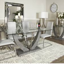 The Lisbon Dining Table Has Show Stopper Looks However It Won T Dominate Your Space Th Glass Dining Room Table Glass Dining Table Decor Dining Room Table Decor