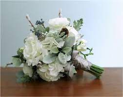 Silk wedding bouquets with runuculus and pine cones. Pin On Bouquets